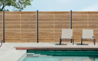 Transformez votre espace extérieur avec une clôture en bois !